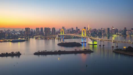 Time-lapse-of-Tokyo-city-skyline-view-from-Odaiba-in-Japan-day-to-night-timelapse-4K