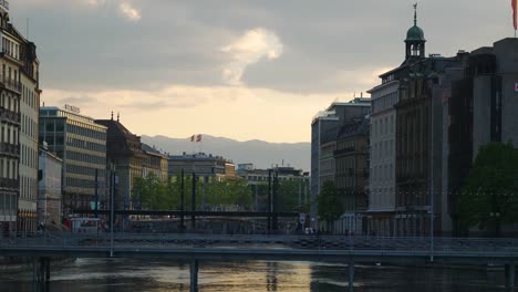 sunset-geneva-city-lakeside-bay-pedestrian-bridge-slow-motion-panorama-4k-switzerland