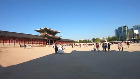 Hyper-lapse-at-People-walking-on-Gyeongbokgung-Palace-and-Seoul-City,South-Korea