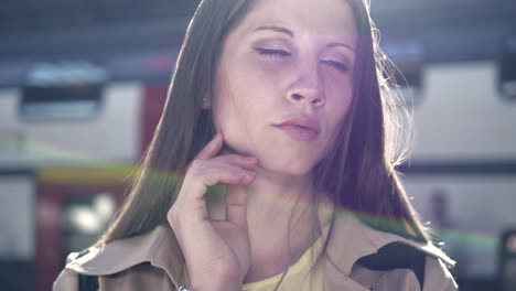 Young-adult-woman-enjoying-her-day-in-the-city-and-at-the-train-station