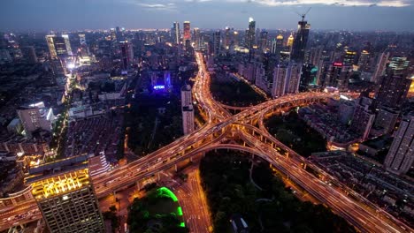 TL,-WS-Rush-hour-traffic-on-multiple-highways-and-flyovers-at-night-/-Shanghai,-China