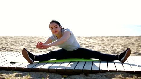 girl-doing-workout-on-beach
