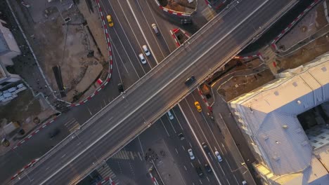 russia-sunset-sky-moscow-city-center-traffic-road-junction-aerial-down-panorama-4k