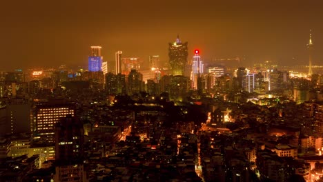 china-sunset-macau-famous-hotel-rooftop-cityscape--downtown-panorama-4k-time-lapse