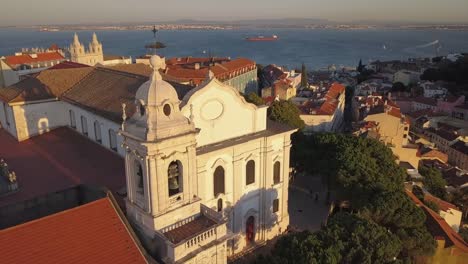 portugal-sunset-miradouro-da-senhora-do-monte-lisbon-city-bay-aerial-panorama-4k