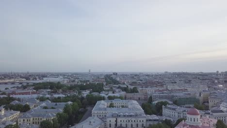 Aerial-view-around-the-Paradny-Quarter-in-the-center-of-Saint-Petersburg-on-a-sunny-evening---streets-with-traffic,-yards,-buildings-...-Russia,-Saint-Petersburg