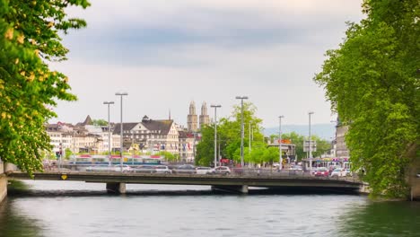 switzerland-sunny-zurich-city-river-traffic-bridge-grossmunster-panorama-4k-timelapse