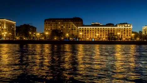 view-of-illuminated-night-river-,-embankment-and-the-movement-of-river-vessels,time-lapse