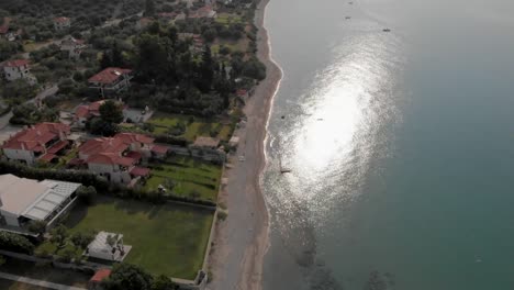 Aerial-view-of-the-small-Greek-village-on-the-shore-of-the-Aegean-Sea