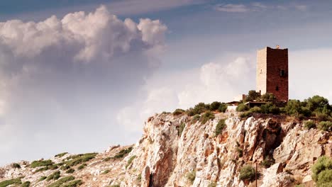 Stone-tower-house-on-Mani,-Greece.-Time-lapse