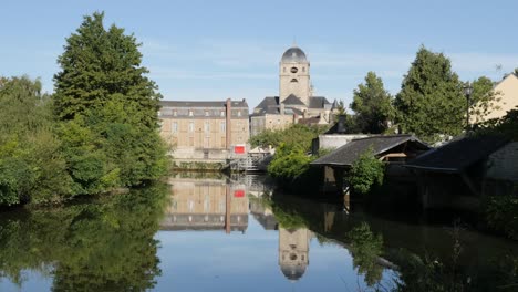 Tilting-on-Notre-Dame-of-Alencon-basilique-lower-Normandy-France-river-Sarthe-by-the-day