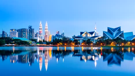 Día-a-noche-Kuala-Lumpur-Cityscape-de-Malasia-4K-Time-Lapse-(zoom-out)