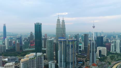 noche-tiempo-kuala-lumpur-centro-construcción-aérea-Malasia-panorama-4k