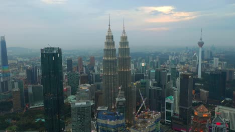 sunset-time-illumination-kuala-lumpur-downtown-aerial-panorama-4k-malaysia