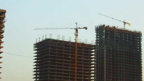 Pan-shot-of-a-buildings-under-construction