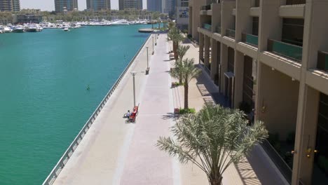 uae-dubai-marina-sunny-day-walking-bay-down-view-4k