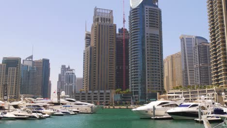 uae-sun-light-day-time-dubai-marina-boat-parking-panorama-4k