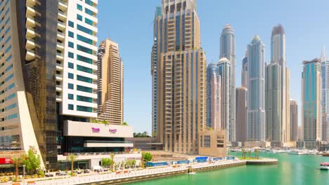 Uae-sunny-day-dubai-marina-tourist-walking-bay-panorama-4k-time-lapse