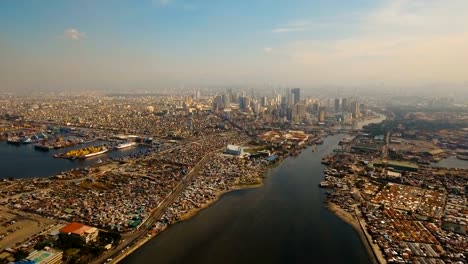 Luftbild-Stadt-mit-Wolkenkratzern-und-Gebäuden.-Philippinen,-Manila,-Makati