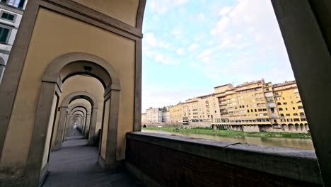 Ponte-Vecchio-bridge-in-Florence,-Italy.-The-Ponte-Vecchio-("Old-Bridge")-is-a-Medieval-stone-closed-spandrel-segmental-arch-bridge-over-the-Arno-River,-in-Florence,-Italy.