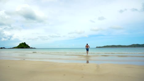 Man-running-on-the-beach