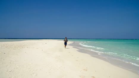 Man-running-on-the-beach