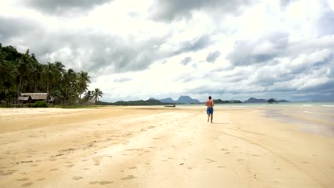 Man-running-on-the-beach