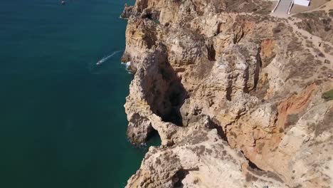 Aerial-view-of-Ponta-da-Piedade-rock-formations-in-Lagos,-Portugal