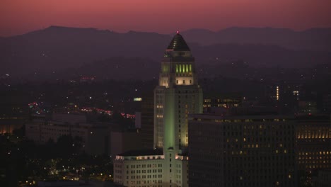 Los-Angeles,-Aerial-shot-of-Los-Angeles-city-hall-at-dusk.