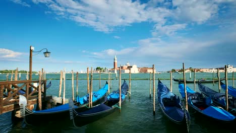 Gondolas-in-lagoon-of-Venice,-Italy