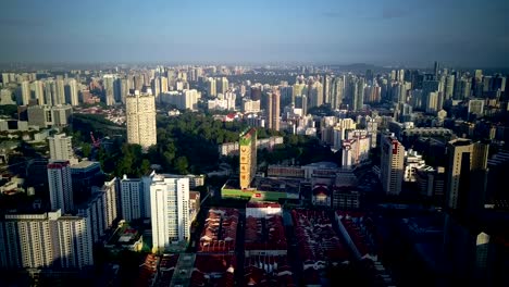 Beautiful-morning-drone-footage-of-Singapore-urban-skyline-and-its-residential-buildings-at-Chinatown.