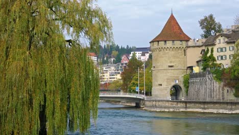 Tower-(Nolliturm)-near-Reuss-river-part-of(Museggmauer,-Lucerne,-Switzerland