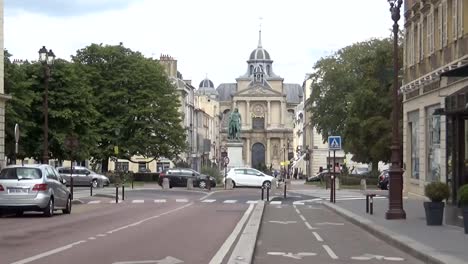 Ancient-buildings,-greenery-and-busy-street,-Paris,-France