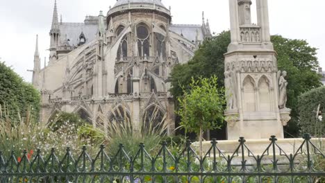 Detailed-Notre-Dame-Cathedral-located-in-French-capital-Paris-slow-tilt