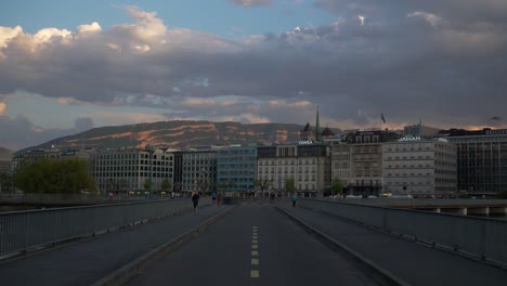 sunset-sky-geneva-city-river-bridge-slow-motion-panorama-4k-switzerland