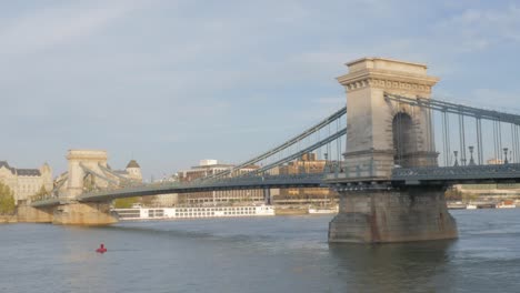 Szechenyi-Chain-Bridge-of-Budapest-on-river-Danube-by-the-day-4K-2160p-UltraHD-footage---Famous-Chain-Bridge-located-in-Hungarian-capital-of-Budapest-4K-3840X2160-UHD-video