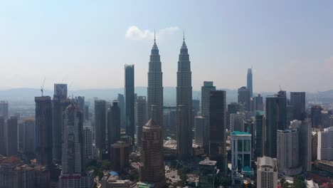 sunny-day-kuala-lumpur-city-downtown-famous-towers-aerial-panorama-4k-malaysia