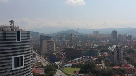 sunny-day-kuala-lumpur-city-constructions-aerial-panorama-4k-malaysia