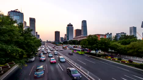 Beijing,-China-Sept.-29,-2014:-Walking-and-looking-the-transportation-on-Chang'an-Avenue-near-Guomao-CBD,Beijing,-China