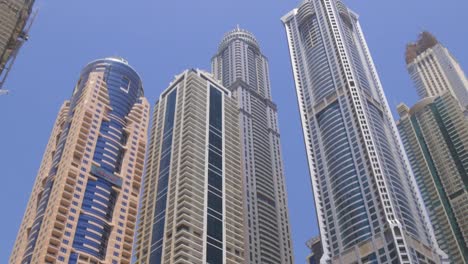 uae-dubai-marina-day-light-skyscrapers-jungle-4k