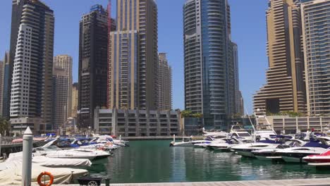 uae-day-light-panorama-yacht-dock-dubai-marina-4k