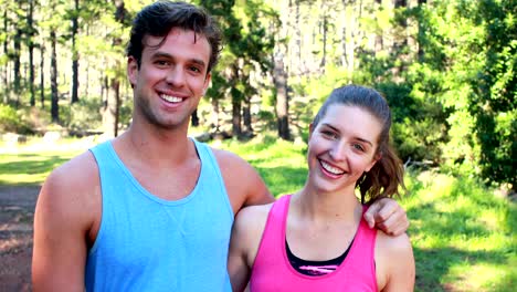 Smiling-athletic-couple-jogging-together