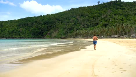 Man-running-on-the-beach