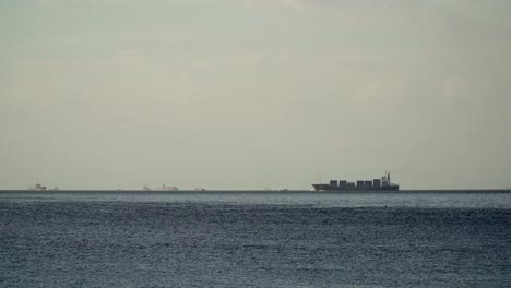 Cargo-ship-sails-on-the-sea.-Philippines,-Manila