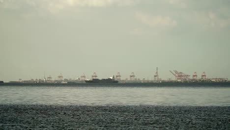 Cargo-ship-sails-on-the-sea.-Philippines,-Manila