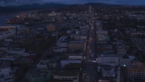 Aerial-View-flying-over-downtown-Vancouver-at-sunset