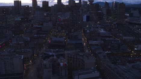 Aerial-View-flying-over-downtown-Vancouver-at-sunset