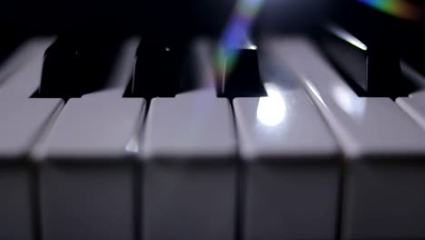 Piano-keys-on-a-dark-background-in-motion