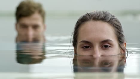 Loving-Man-and-Woman-in-Swimming-Pool