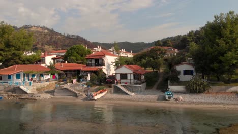 Aerial-view-of-the-small-Greek-village-on-the-shore-of-the-Aegean-Sea